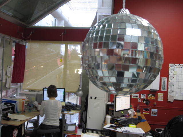 Photo of disco ball in office setting. 