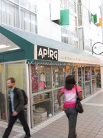 Photo of APIRG store front and window display.